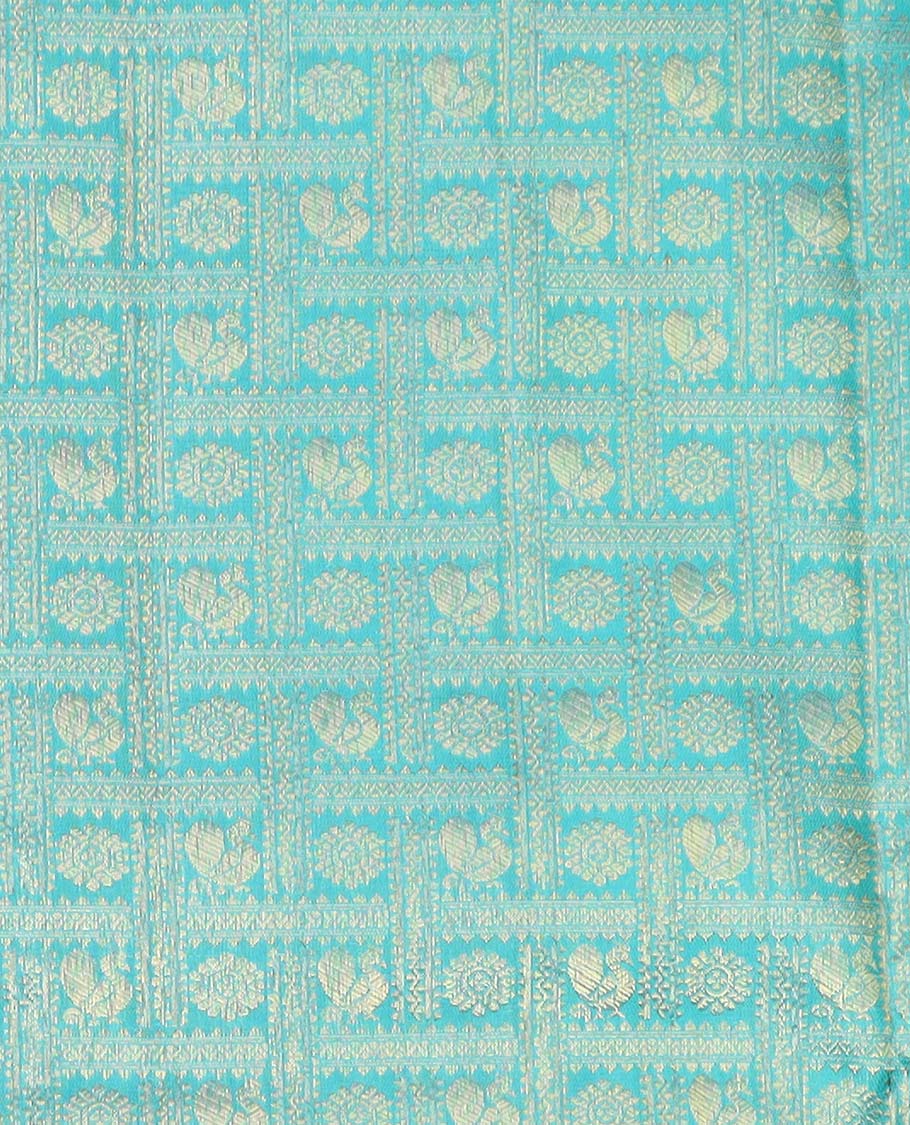 Blue pure silk half saree, mayil chakram enclosed checked skirt, contrast border and blouse of kodi visiry, neli, muthu, lavangam, and jaal, and intricate dhavani - Image 4