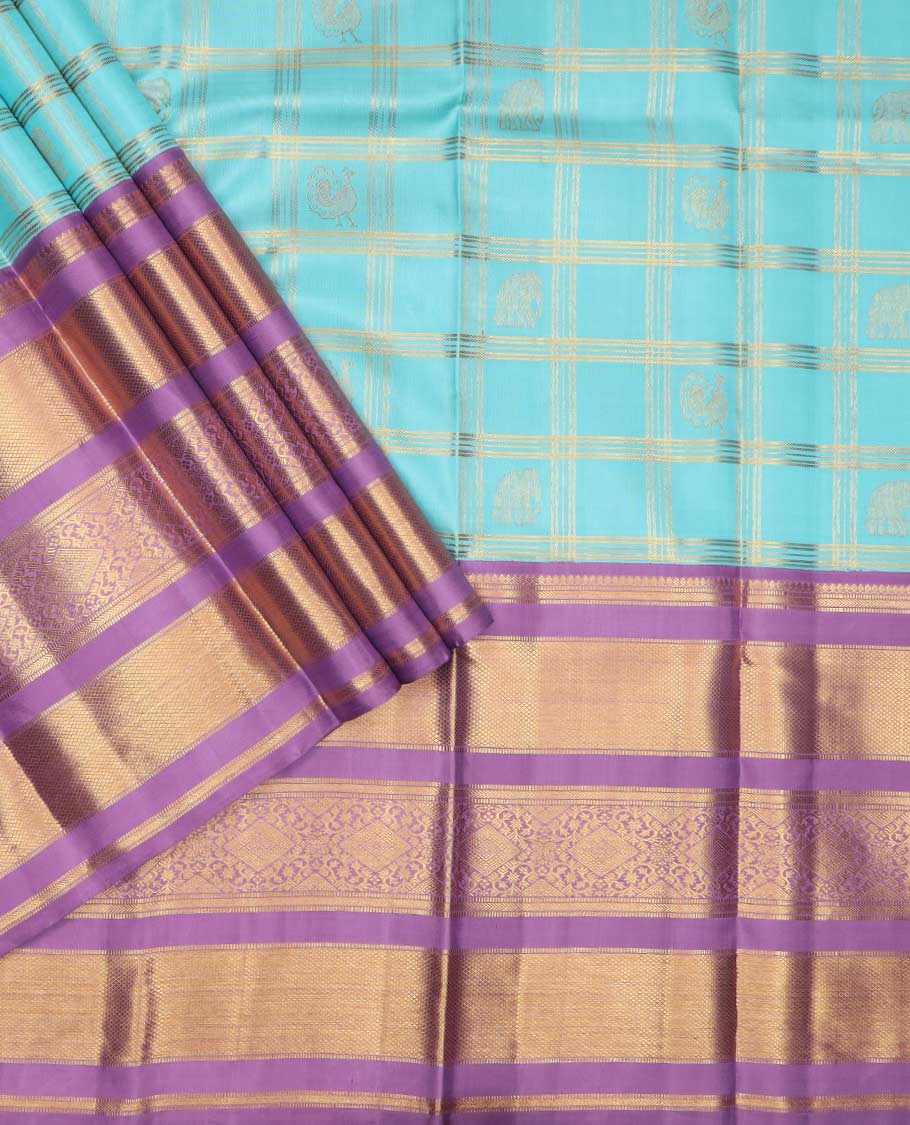 Blue puresilk halfsaree, yaanai and mayil butta enclosed checked skirt, contrast blouse and border of traditional designs in zari, and zari design dhavani - Image 2