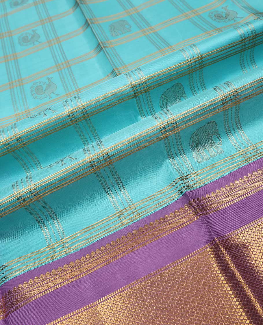 Blue puresilk halfsaree, yaanai and mayil butta enclosed checked skirt, contrast blouse and border of traditional designs in zari, and zari design dhavani - Image 6