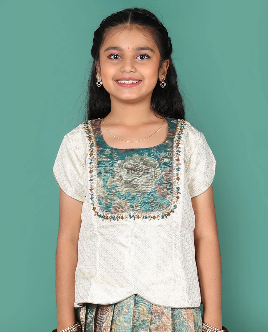 Blue readymade art silk pavadai, floral print & zari border skirt & jacquard embroidered round neck half-sleeve blouse - Image 2