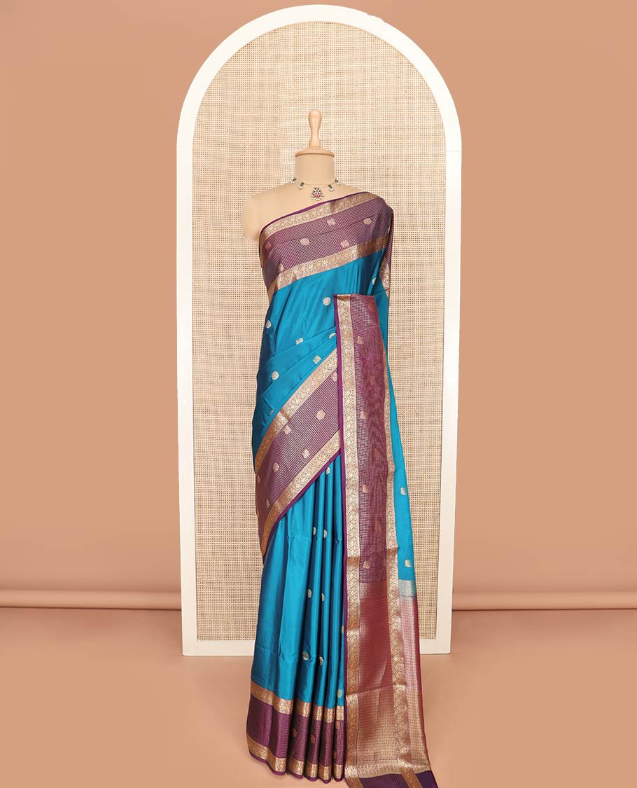 Blue Semi-Soft Silk Saree Prettified with Peacock Chakram Buttas, Complemented by Contrast Traditional Zari Border Featuring Peacock Chakram Designs, Meticulously Woven with Pallu of Jaal Designs, and Paired with a Contrast Blouse - Image 3