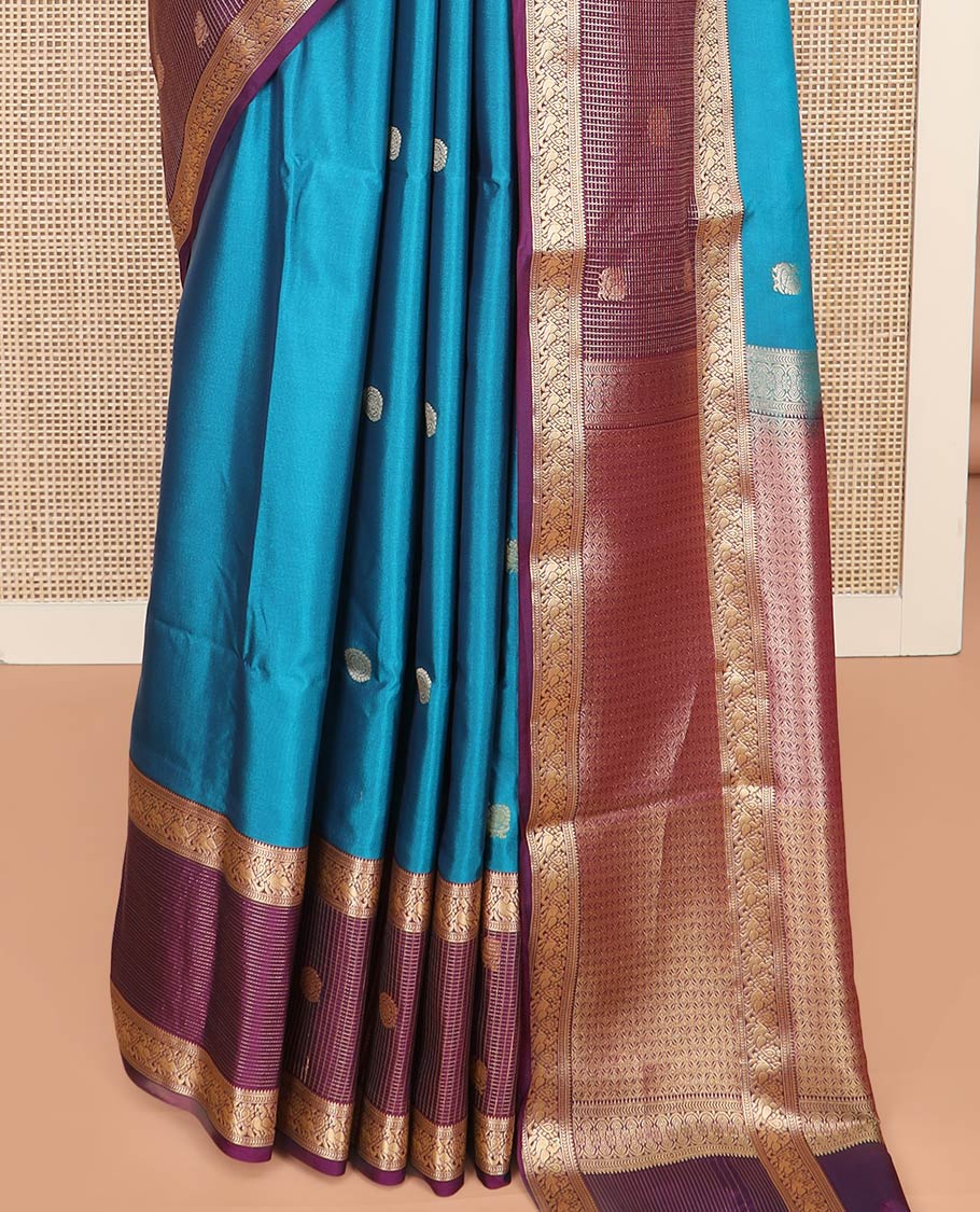 Blue Semi-Soft Silk Saree Prettified with Peacock Chakram Buttas, Complemented by Contrast Traditional Zari Border Featuring Peacock Chakram Designs, Meticulously Woven with Pallu of Jaal Designs, and Paired with a Contrast Blouse - Image 4