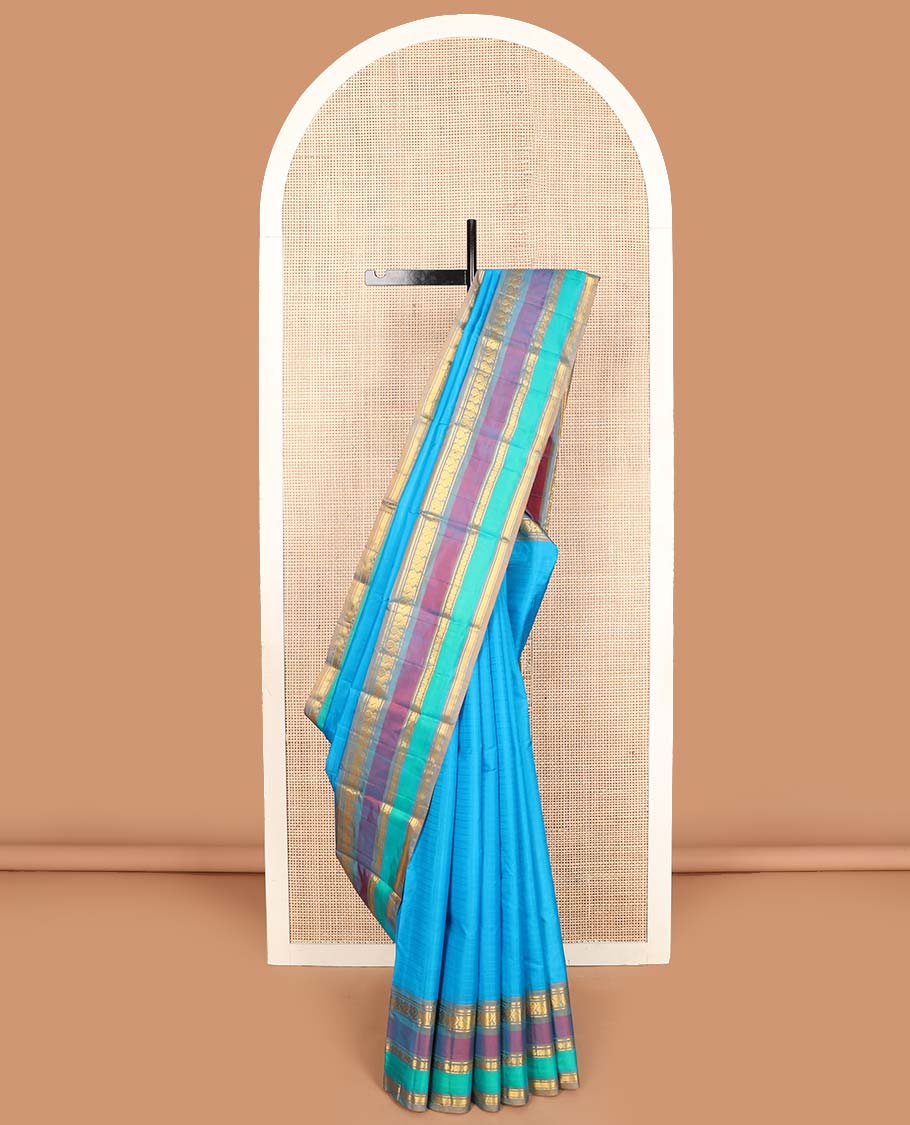 Blue striped Kanchipuram silk saree, contrast border of rekku, banaras, mayil, manga, rudraksham, and kathir designs, and striped pallu
