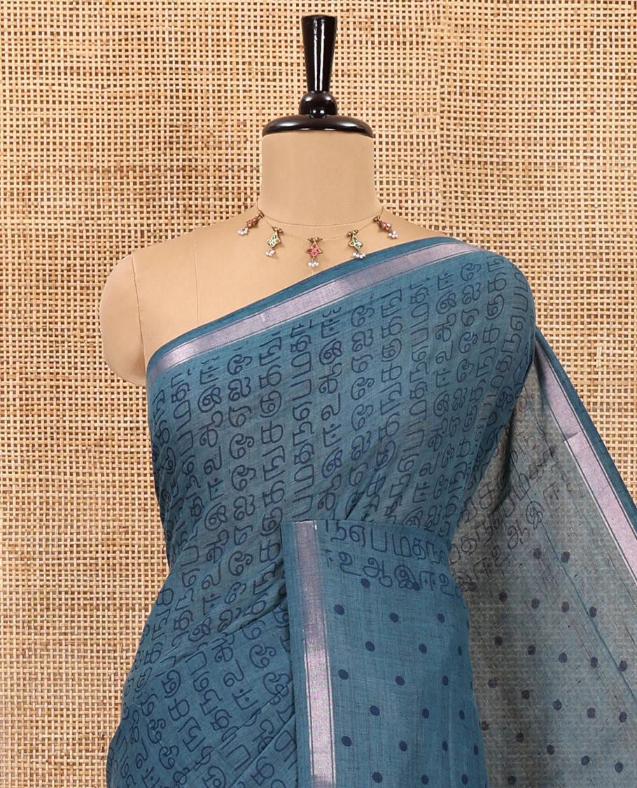 Blue tamil letters printed soft cotton saree, zari piping border, small polka dotted pallu, and blouse of abstract and polka dots print - Image 2