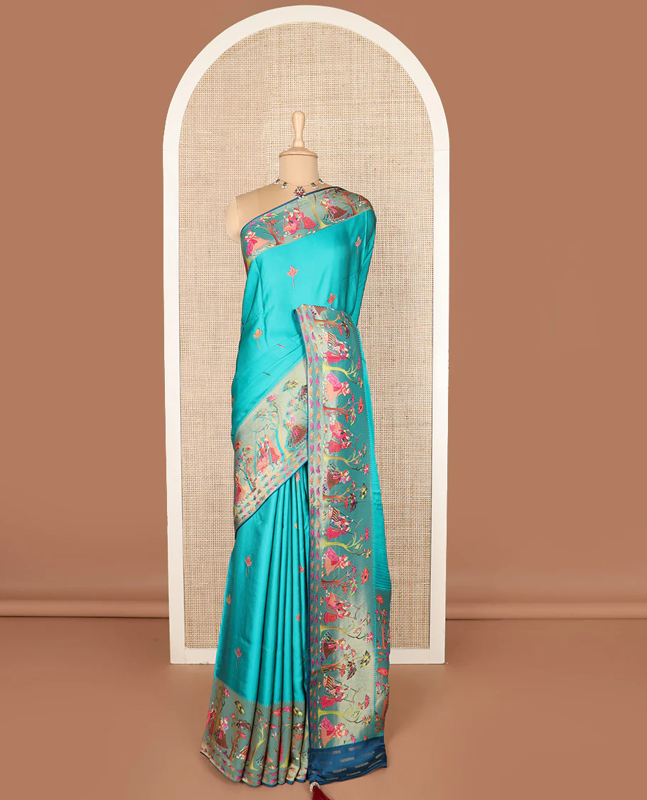Blue unique motifs printed dola silk saree, gleaming zari border, and pallu of Mughal-style man and women motifs - Image 2