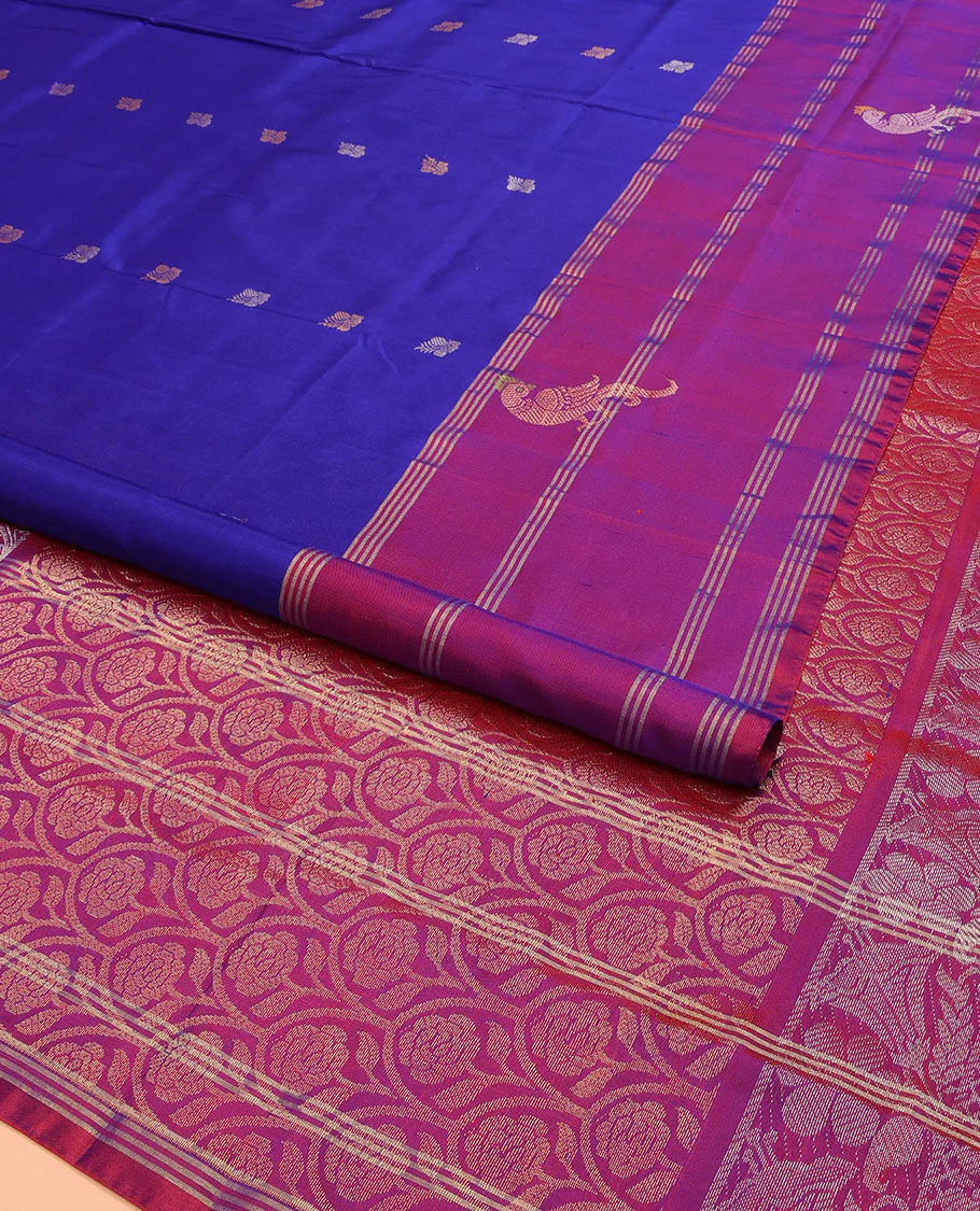 Blue Uppada Silk Saree Enlivened With Zari Buttas, Captivating Contrast Border Featuring Zari Stripes And Peacock Motifs, Pallu Depicting Rose Flower-Enclosed Mughal-Style Arches, And Paired With A Contrast Blouse - Image 2