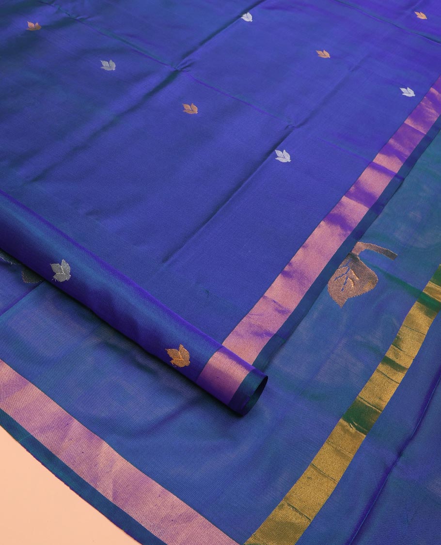 Blue Uppada Silk Saree Featuring Floral Buttas, Subtle Zari Bavanji Border, Pallu Decked Up with Jamdani-Style Floral Motifs, and Paired with a Matching Blouse - Image 2