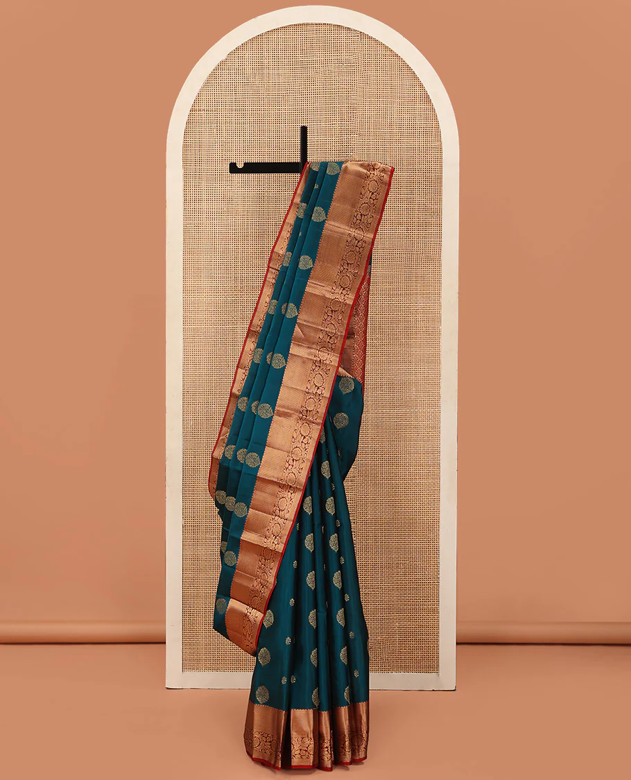 Blue Vasundhara Lite Silk Mix Saree Richly Detailed with Floral Zari Buttas, Complemented with a Contrast Border Featuring Salngai, Mayil Kann, Kathir, and Kodi Visiry Designs, Pallu Decked Up with Floral Designs, and Paired with a Contrast Blouse