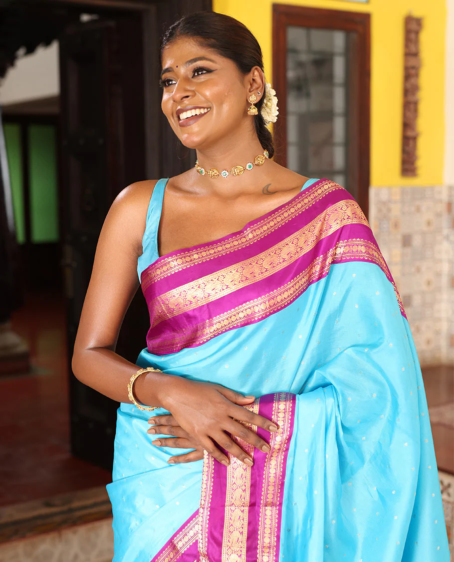 Blue Vasundhara Silk Saree Gracefully Embellished with Zari Buttas, Complemented by a Varisai Pettu Border Featuring Rekku, Muthu, Banaras, Rudraksham, and Mayil Designs, Majestically Woven with a Zari-Designed Pallu, and Paired with a Contrast Blouse - Image 2