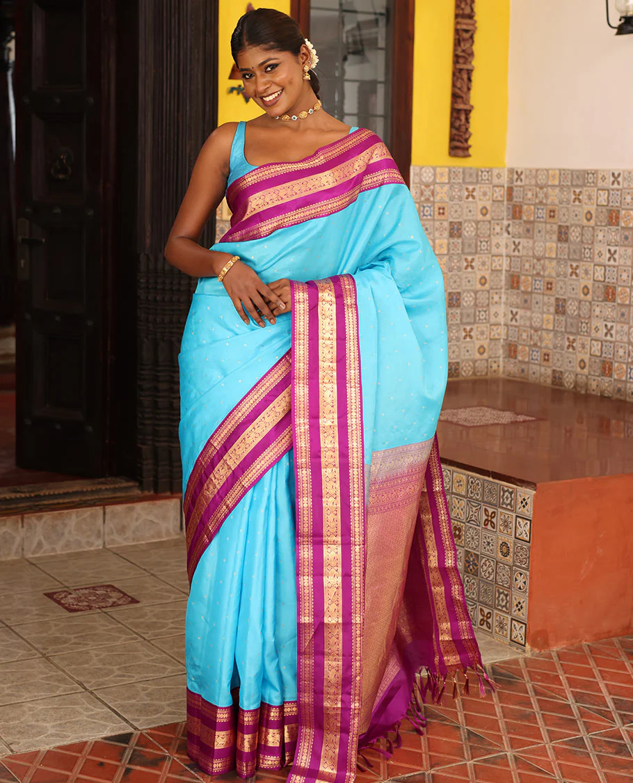 Blue Vasundhara Silk Saree Gracefully Embellished with Zari Buttas, Complemented by a Varisai Pettu Border Featuring Rekku, Muthu, Banaras, Rudraksham, and Mayil Designs, Majestically Woven with a Zari-Designed Pallu, and Paired with a Contrast Blouse - Image 4