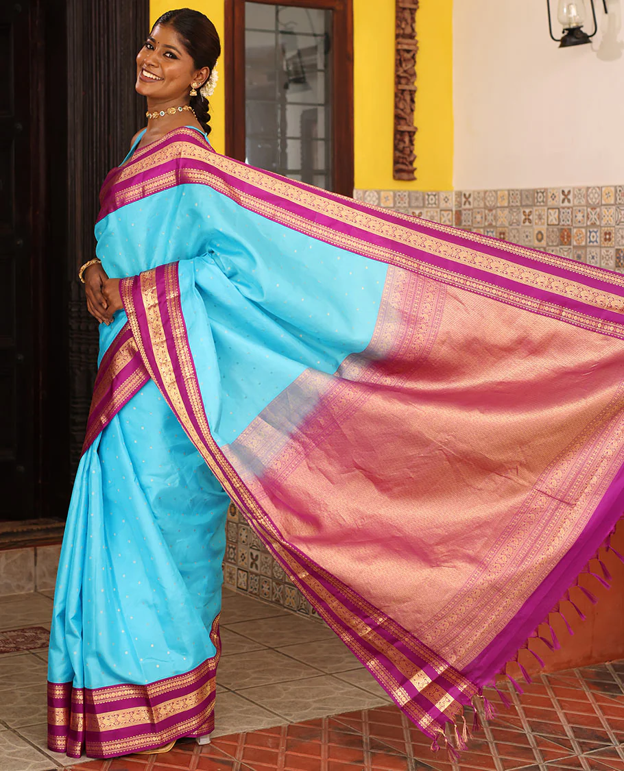 Blue Vasundhara Silk Saree Gracefully Embellished with Zari Buttas, Complemented by a Varisai Pettu Border Featuring Rekku, Muthu, Banaras, Rudraksham, and Mayil Designs, Majestically Woven with a Zari-Designed Pallu, and Paired with a Contrast Blouse - Image 5