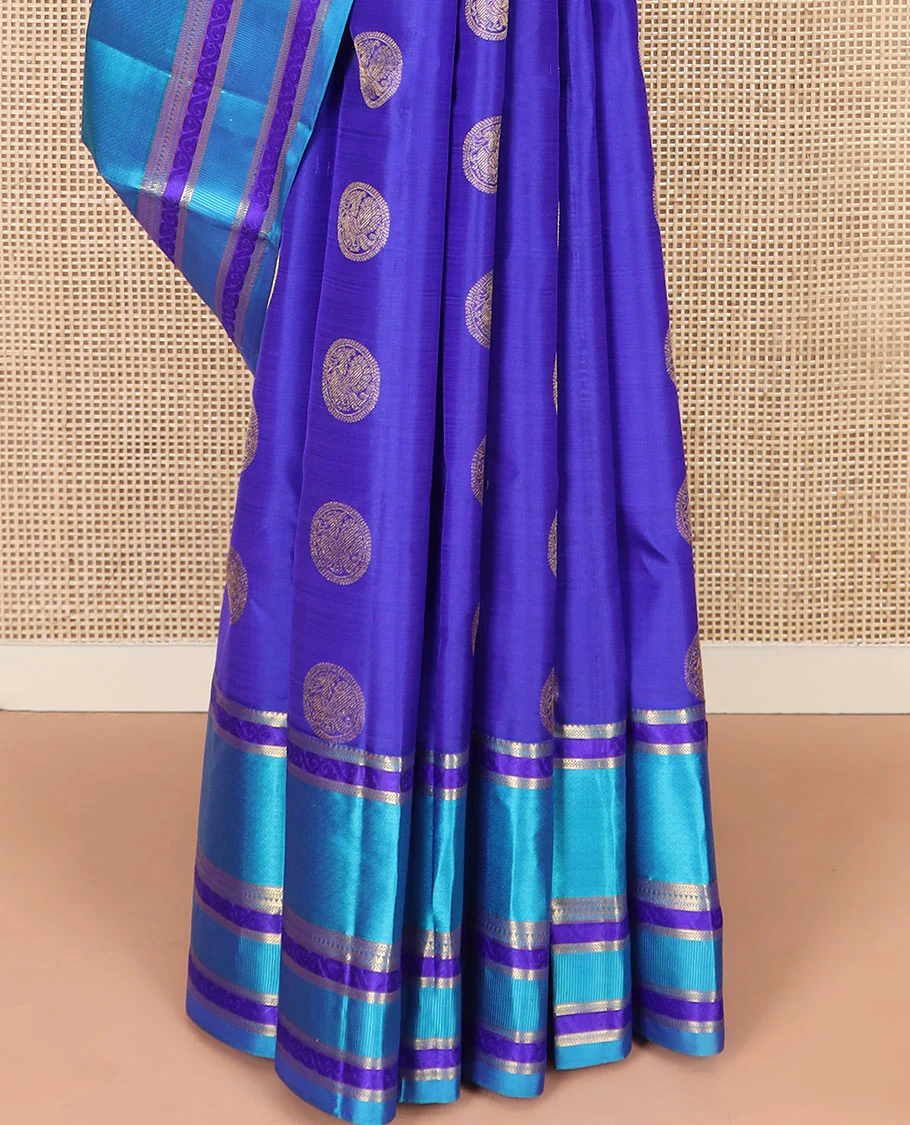 Blue Vasundhara Silk Saree Majestically Detailed with Round Mayil Buttas, Complemented with a Contrast Border of Traditional Zari Designs, Richly Detailed Pallu of Jaal Designs, and Paired with a Contrast Blouse - Image 4