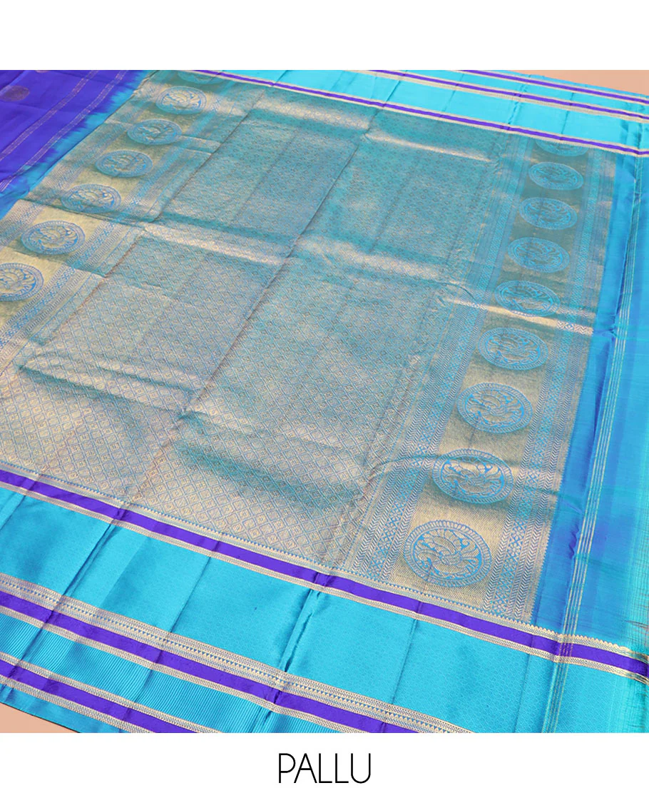 Blue Vasundhara Silk Saree Majestically Detailed with Round Mayil Buttas, Complemented with a Contrast Border of Traditional Zari Designs, Richly Detailed Pallu of Jaal Designs, and Paired with a Contrast Blouse - Image 5