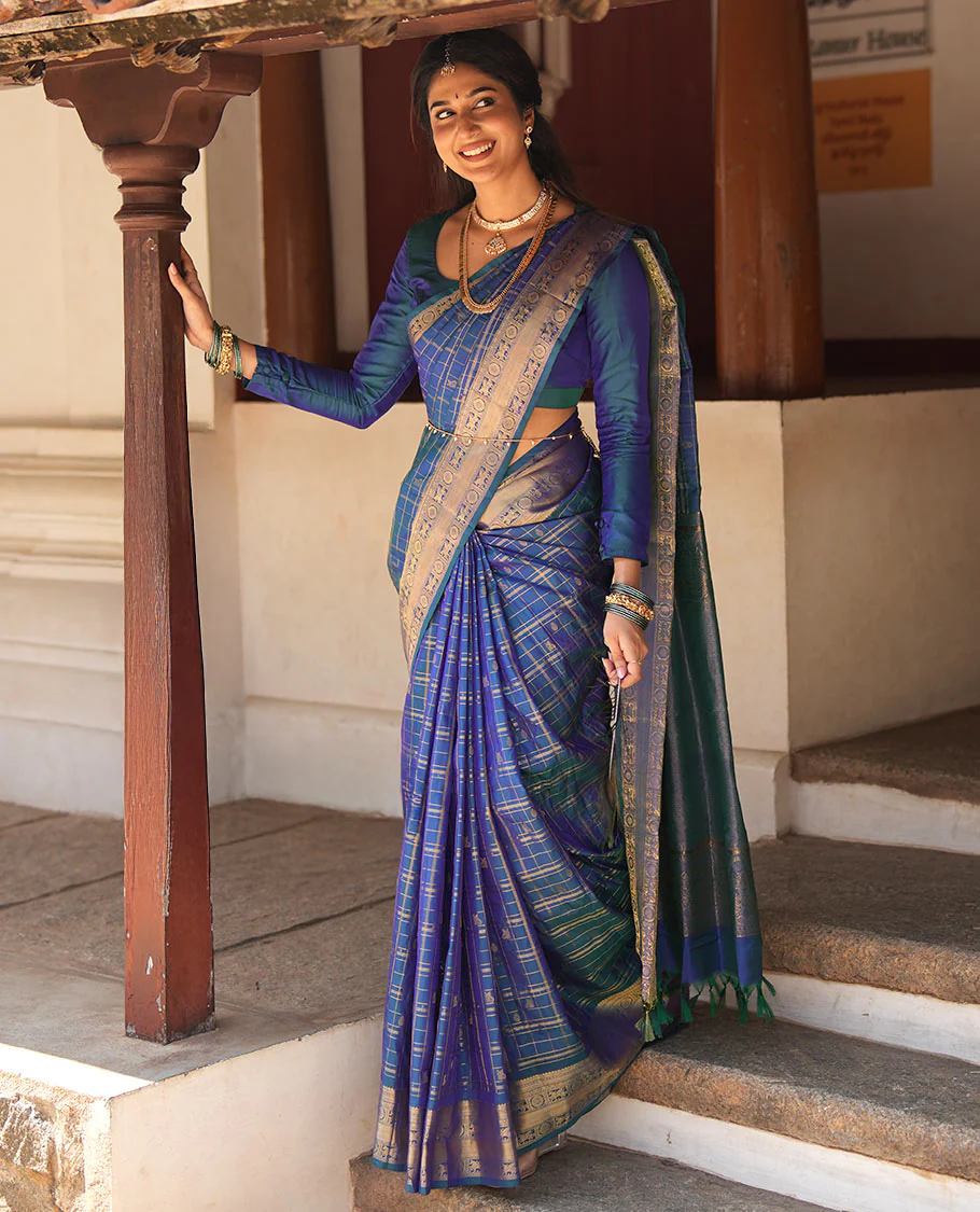 Blue Zari Buttas Enclosed in a Checked Vasundhara silk saree, Zari Border Adorned with Kuthirai and Chakram Designs, and Pallu Features Intricate Designs in Zari - Image 2