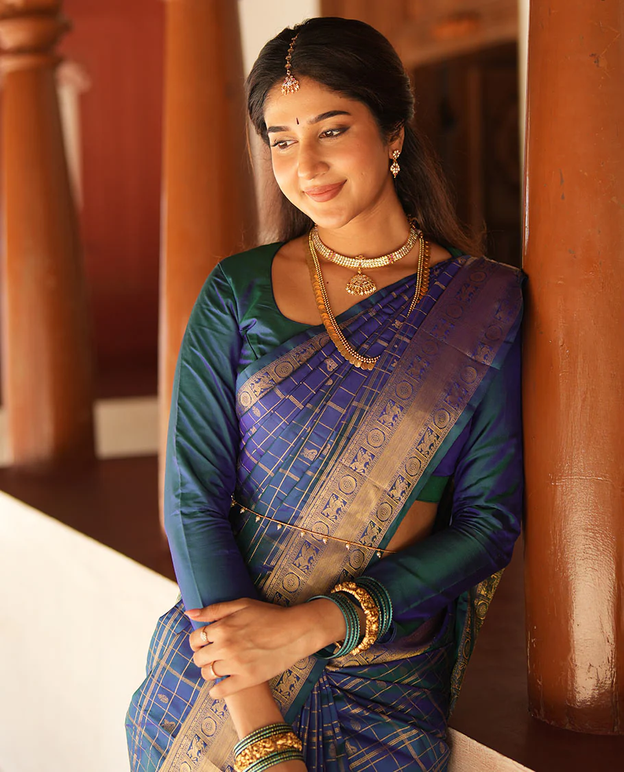 Blue Zari Buttas Enclosed in a Checked Vasundhara silk saree, Zari Border Adorned with Kuthirai and Chakram Designs, and Pallu Features Intricate Designs in Zari - Image 6