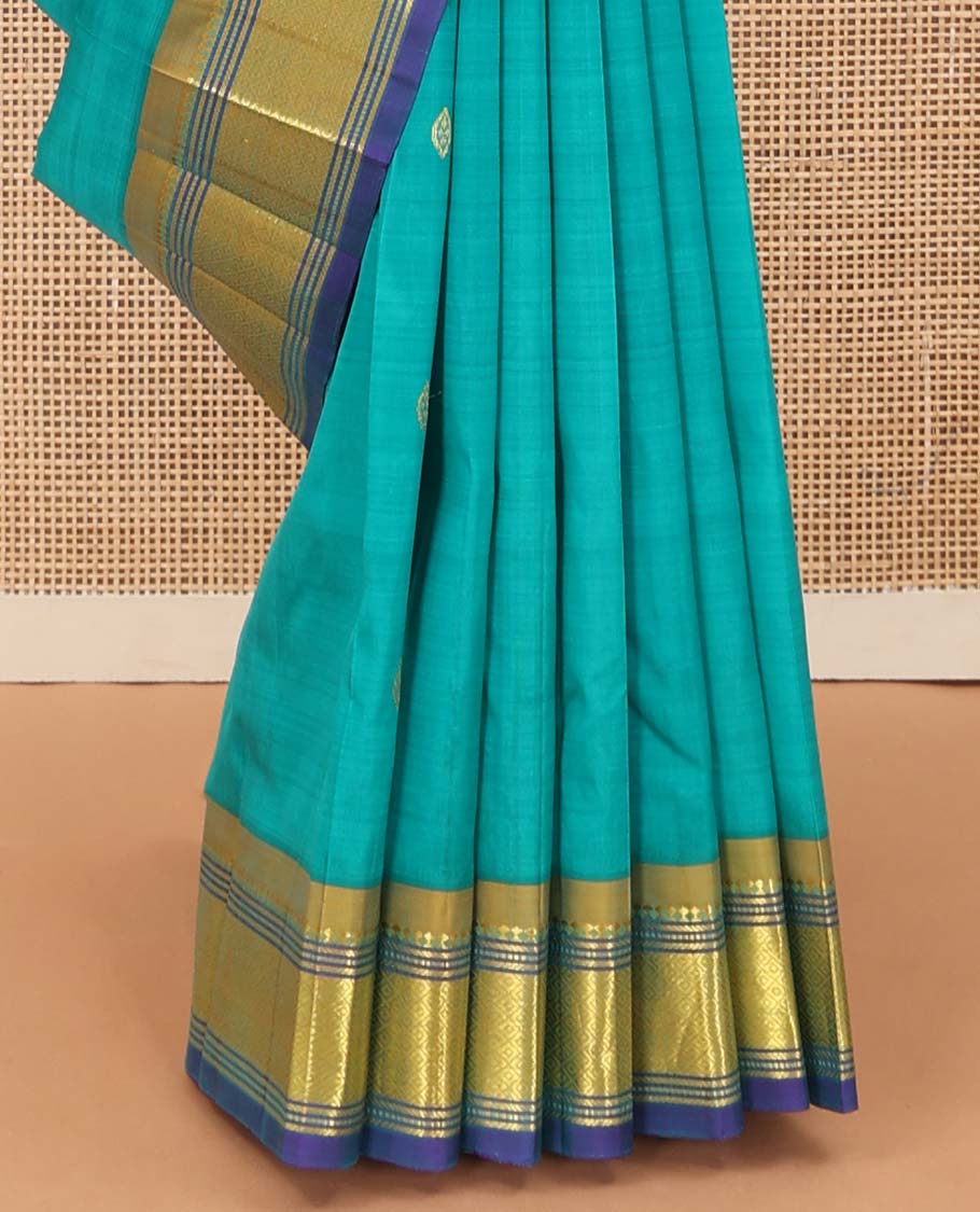 Blue zari buttas Kanchipuram silk saree, contrast border of paneer sombu, banaras, muthu, and mayil kann designs, and floral design pallu - Image 5