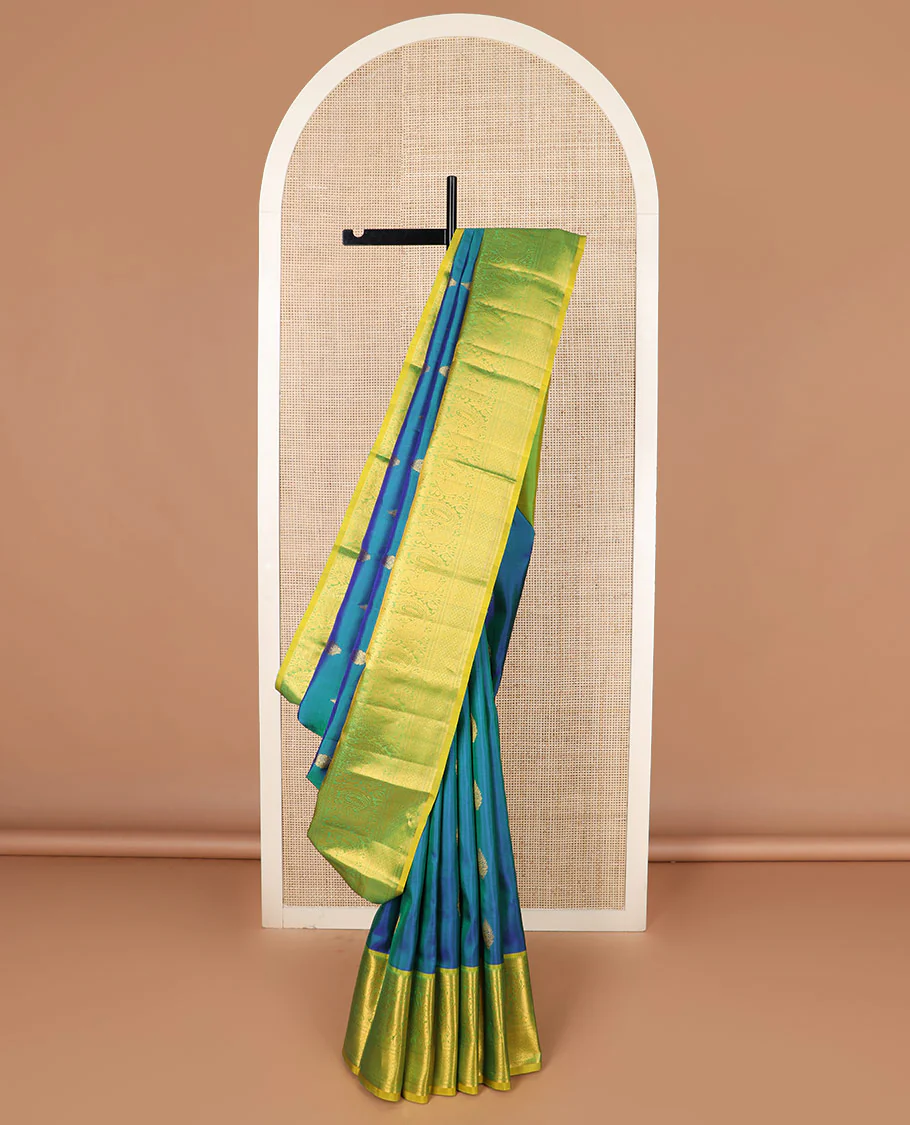 Blue zari buttas Kanchipuram silk saree, contrast border of rekku, kathir, neli, mayil, and mayil kann designs, and  zari design pallu