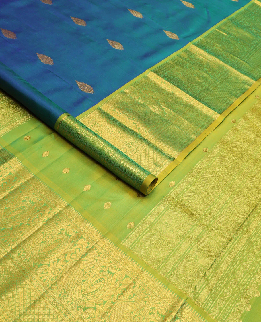 Blue zari buttas Kanchipuram silk saree, contrast border of rekku, kathir, neli, mayil, and mayil kann designs, and  zari design pallu - Image 2
