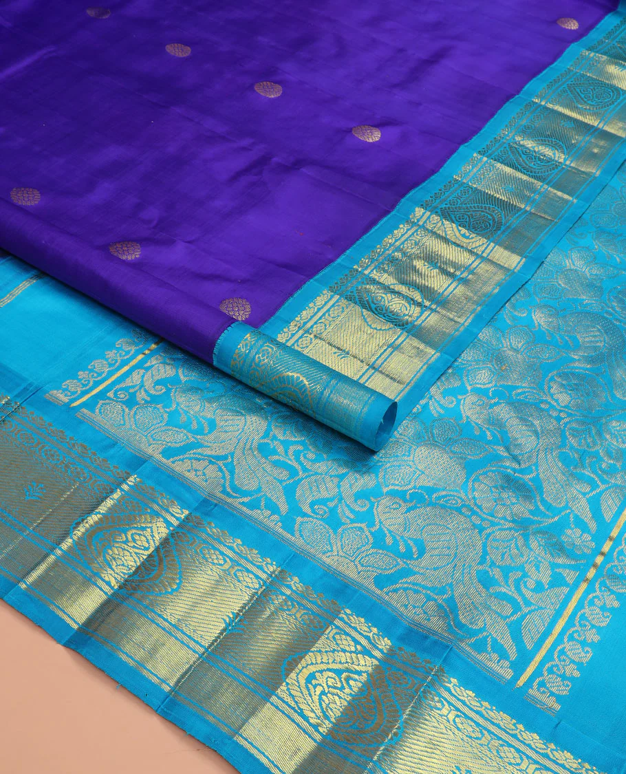 Blue zari buttas kanchipuram silk saree, contrast korvai border of zari designs, and pallu of floral and mayil designs - Image 2