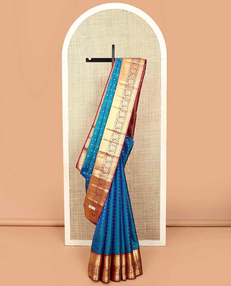 Blue zari buttas Vasundhara silk saree, contrast border of rekku, poun, kamalam, kodi manga kamalam, and jaal designs, and jaal pallu