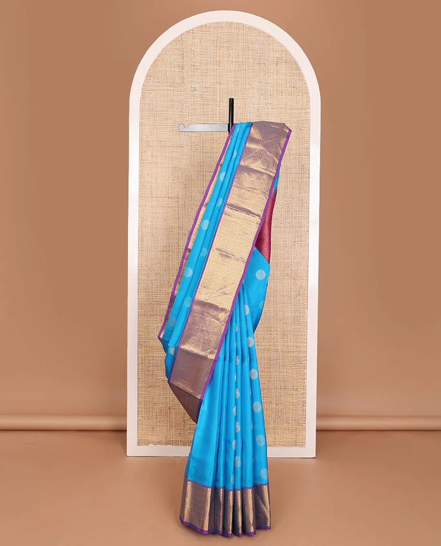 Blue zari buttas Vasundhara Lite Silk Mix Saree, contrast border of manga mokku,muthu,kathir,banaras & poun & scallop pallu