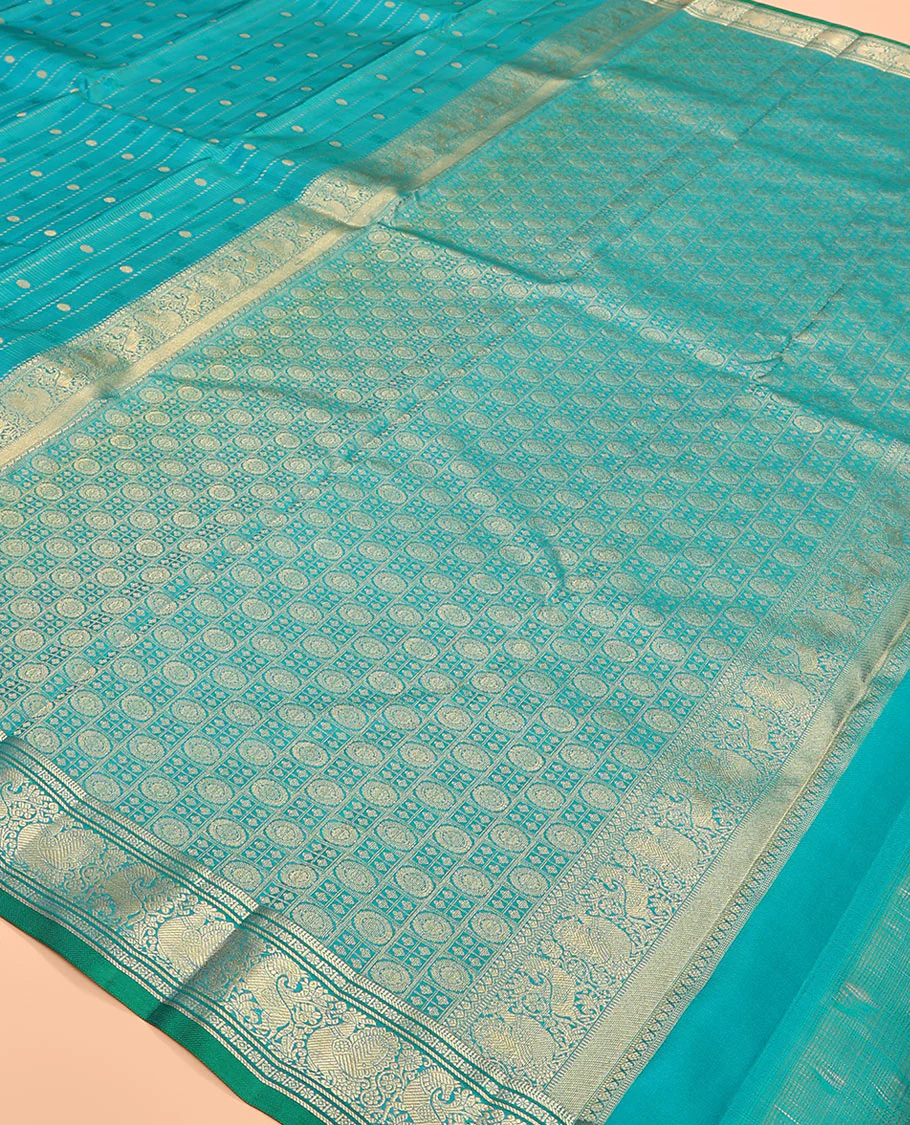 Blue zari design Vasundhara silk saree, zari border of banaras, kamalam, diamond, mayil and kuthirai designs, and chakram buttas steeped pallu - Image 5