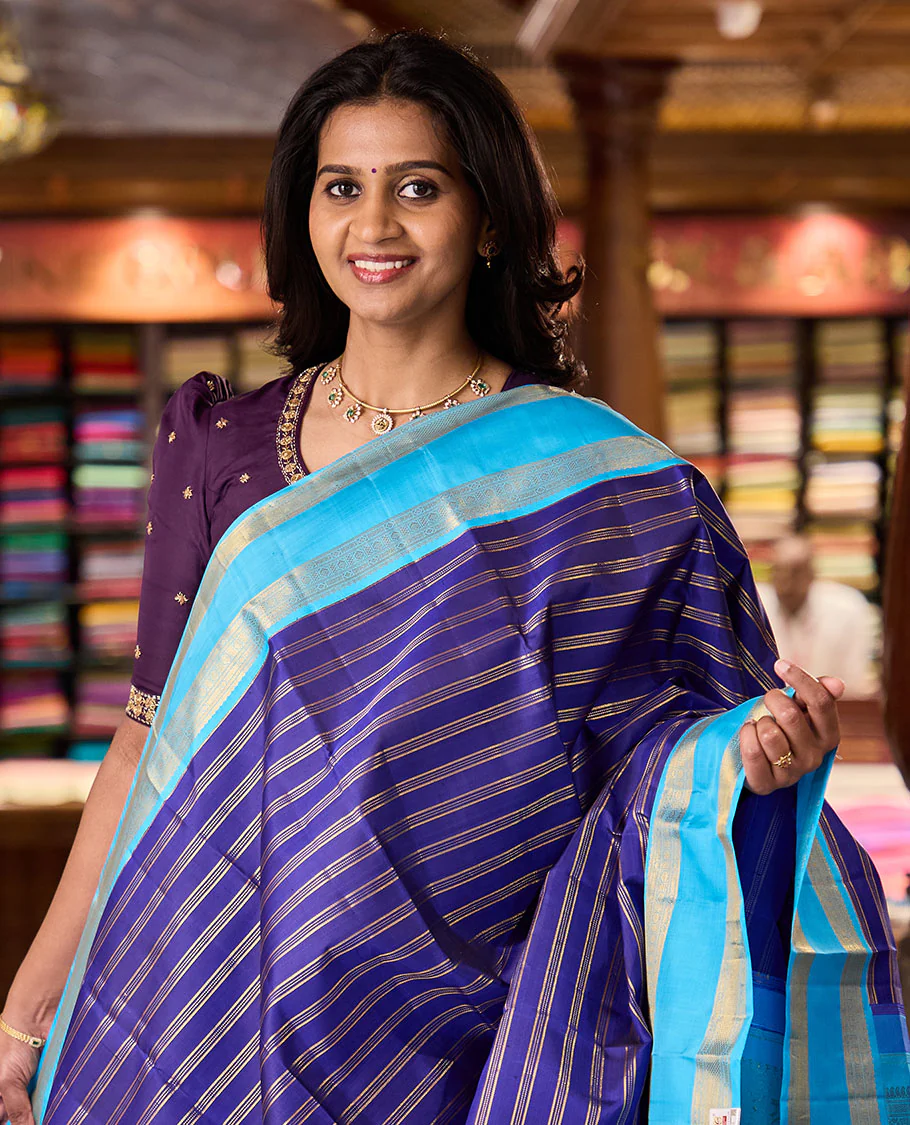 Blue zari striped Kanchipuram silksaree, contrast rettai pettu border of traditional zari designs, and zari-rich jaal pallu - Image 2