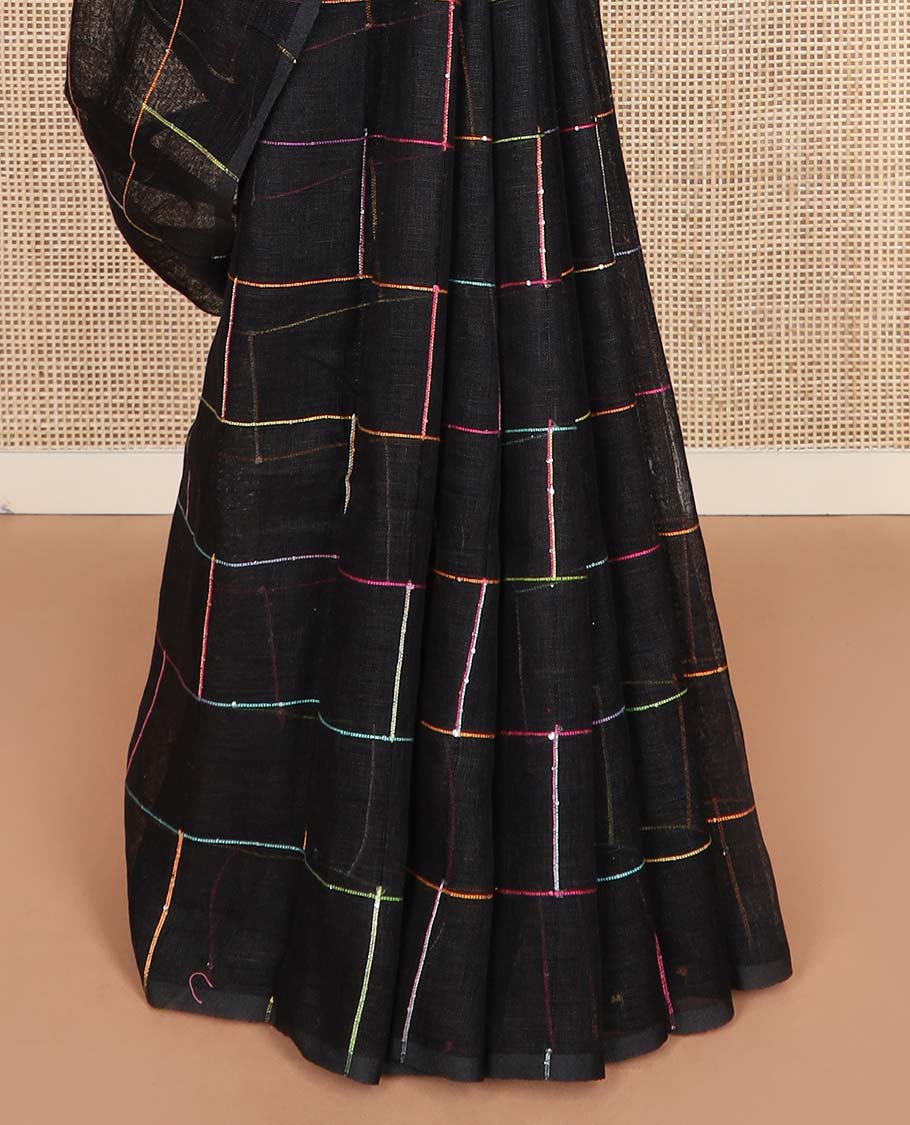 Borderless black checked linen cotton saree, contrast pallu of colorful floral motifs - Image 4