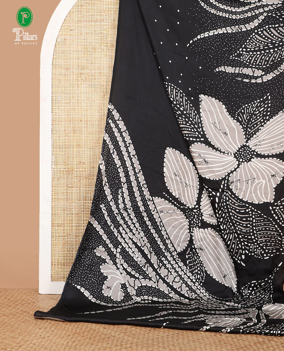 Borderless black half-and-half model satin saree with batik-style big floral motifs digital printed body and pallu - Image 2