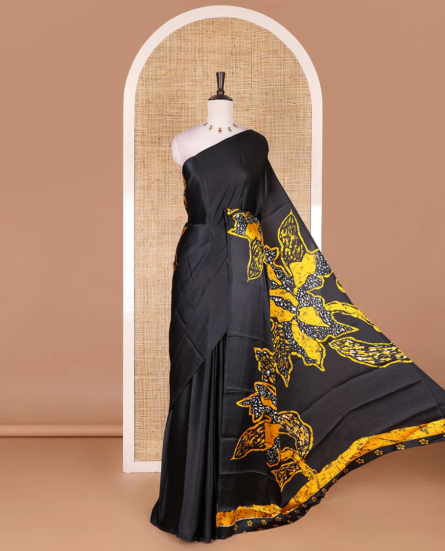 Borderless black-yellow batik style abstract digital printed satin crepe saree with blouse of small buttas