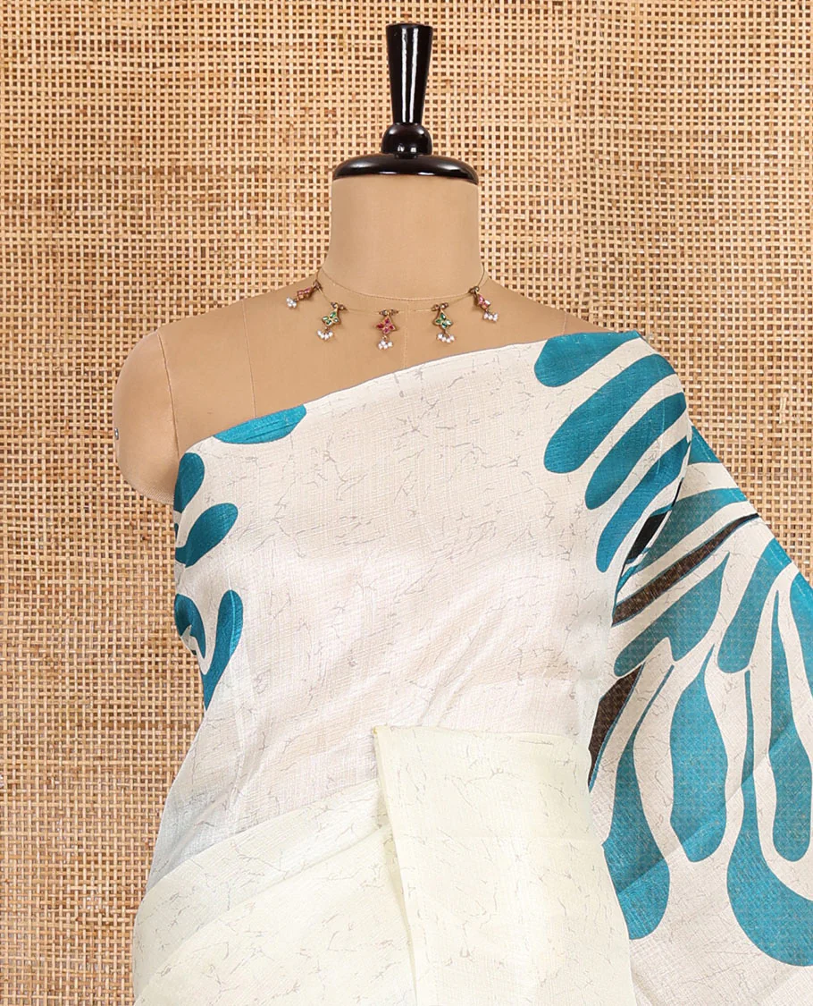 Borderless blue fancy motifs batik-printed art khadi silk saree, contrast printed pallu, and a printed blouse - Image 2