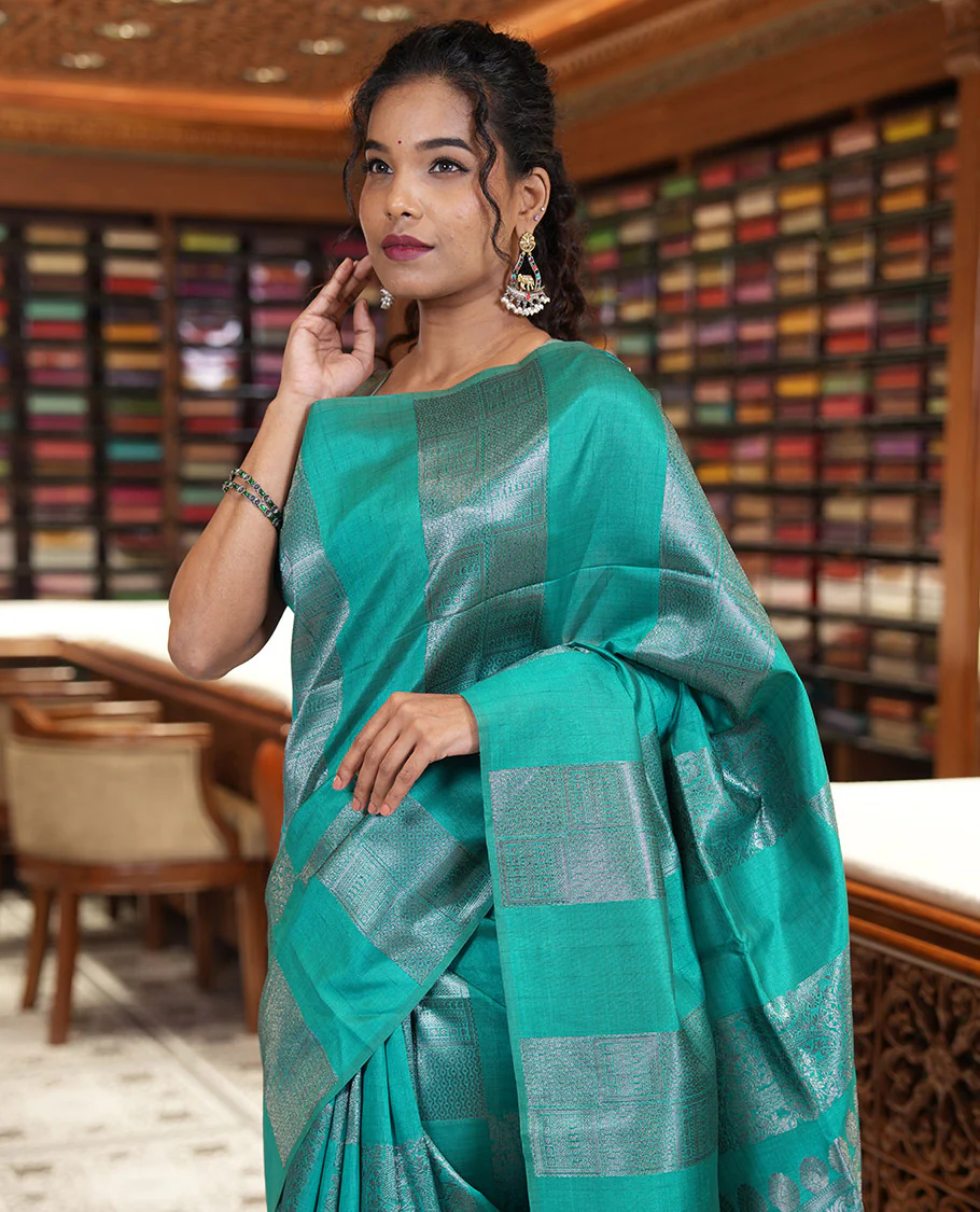 Borderless, blue striped, and zari traditional kanchi motifs fancy tussar saree, intricately zari-woven pallu, and a matching zari buttas woven blouse - Image 2