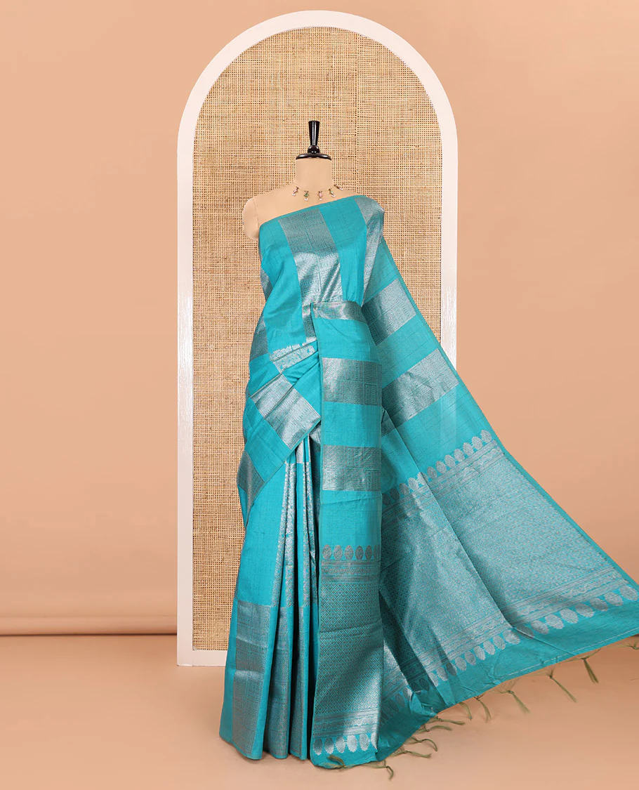 Borderless, blue striped, and zari traditional kanchi motifs fancy tussar saree, intricately zari-woven pallu, and a matching zari buttas woven blouse - Image 3