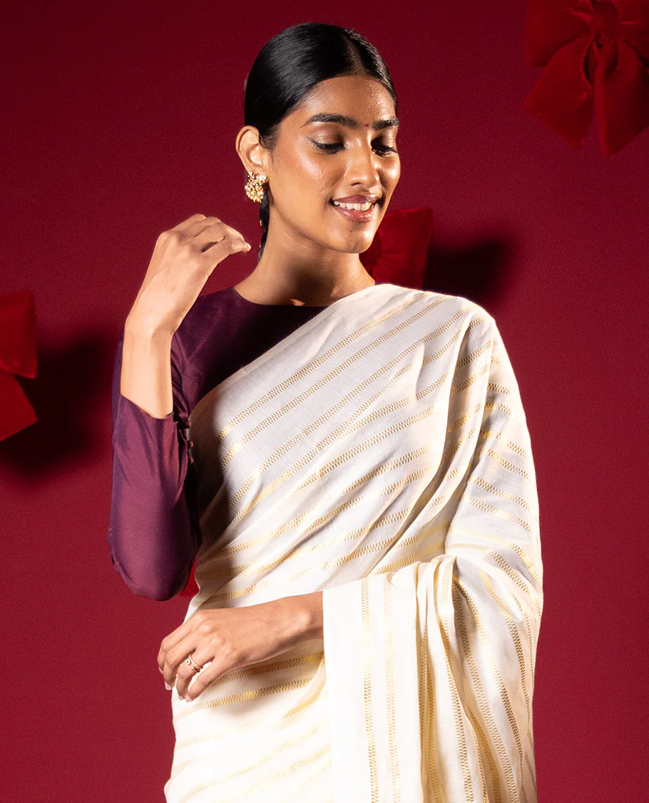 Borderless cream and maroon horizontal zari muthu striped Kerala cotton saree, self-pallu with tassels and a matching blouse - Image 2
