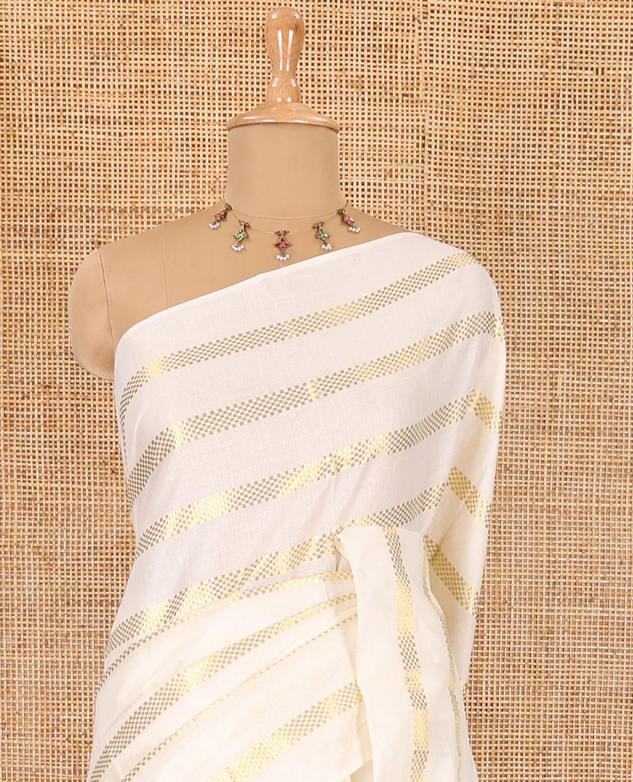 Borderless cream and olive green horizontal muthu zari striped Kerala cotton saree, self-pallu with tassels, and a matching blouse - Image 3