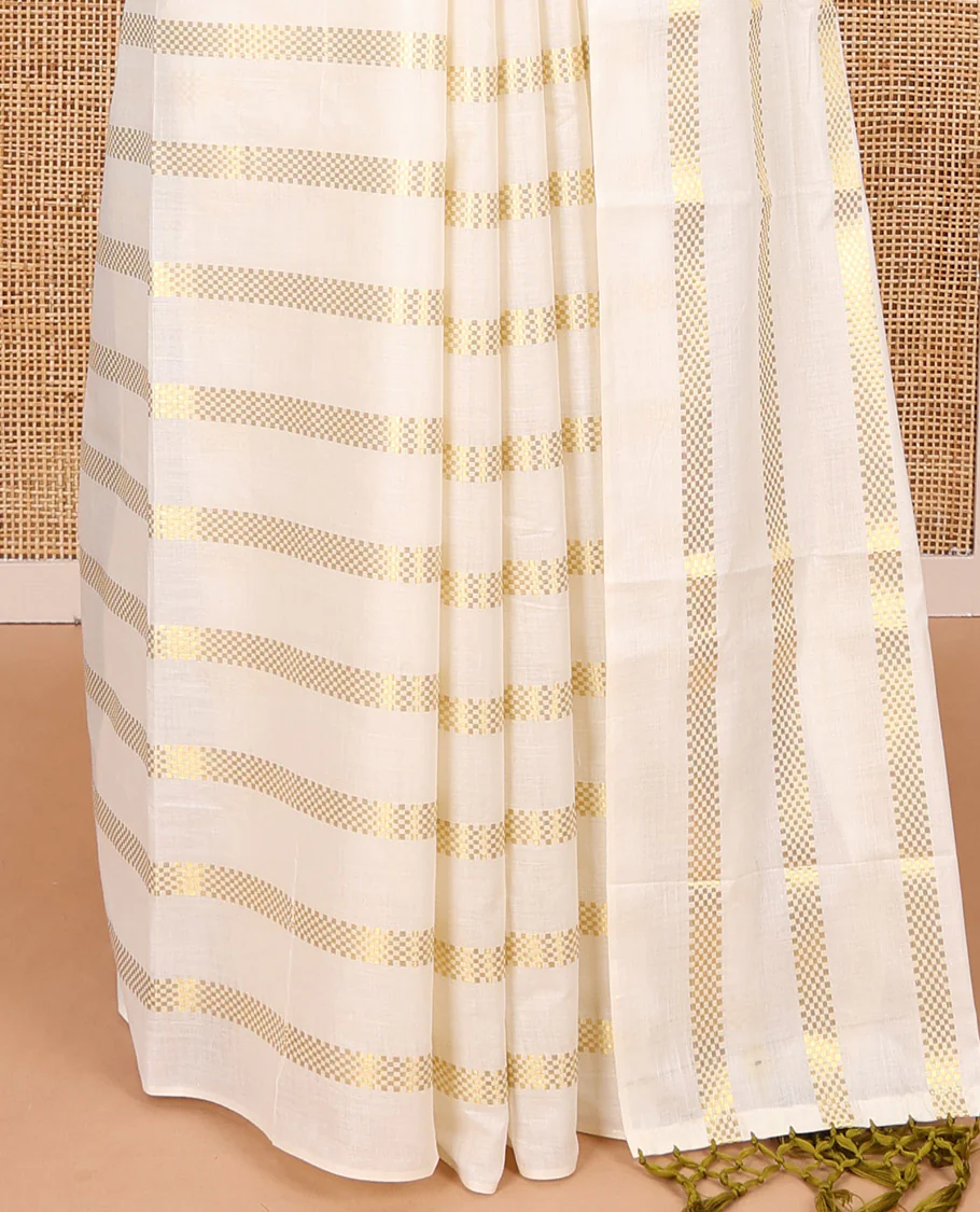 Borderless cream and olive green horizontal muthu zari striped Kerala cotton saree, self-pallu with tassels, and a matching blouse - Image 4
