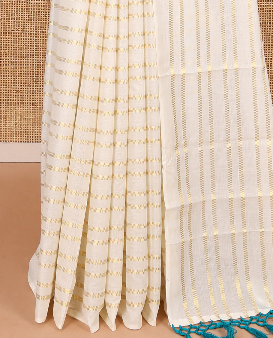 Borderless cream and ramar blue horizontal zari muthu striped Kerala cotton saree, self-pallu with tassels and a matching blouse - Image 4