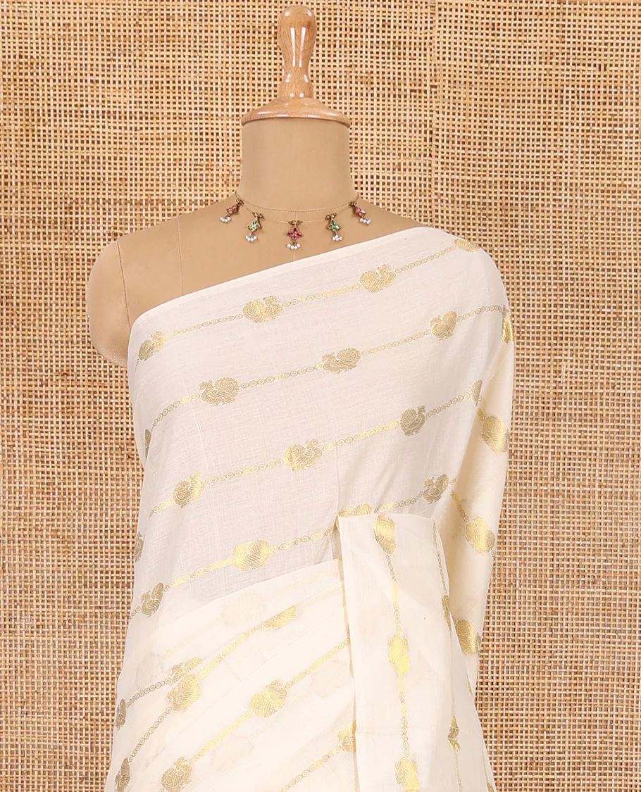 Borderless cream-black peacock and horizontal zari striped Kerala cotton saree, self-pallu with tassels, and a matching blouse - Image 3