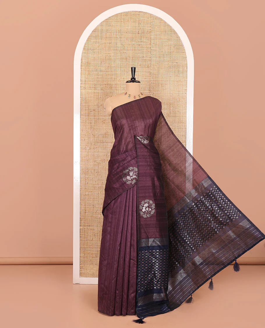 Borderless dark magenta floral buttas matka silk saree, contrast striped and buttas pallu, and a zari buttas woven blouse