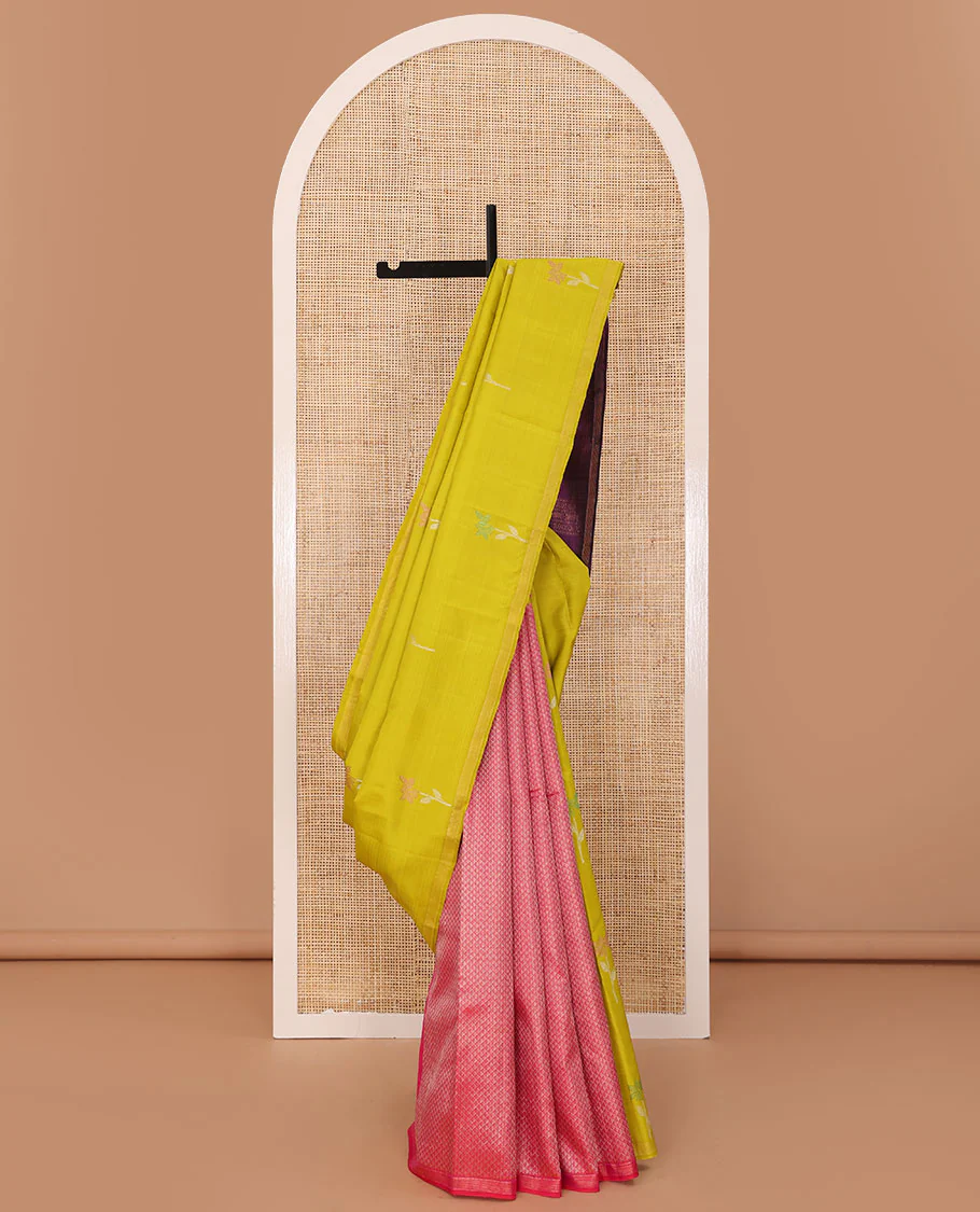 Borderless green-pink half-and-half Kanchipuram silk saree features floral meena buttas, and ara maadam design, contrast traditional motifs zari woven pallu