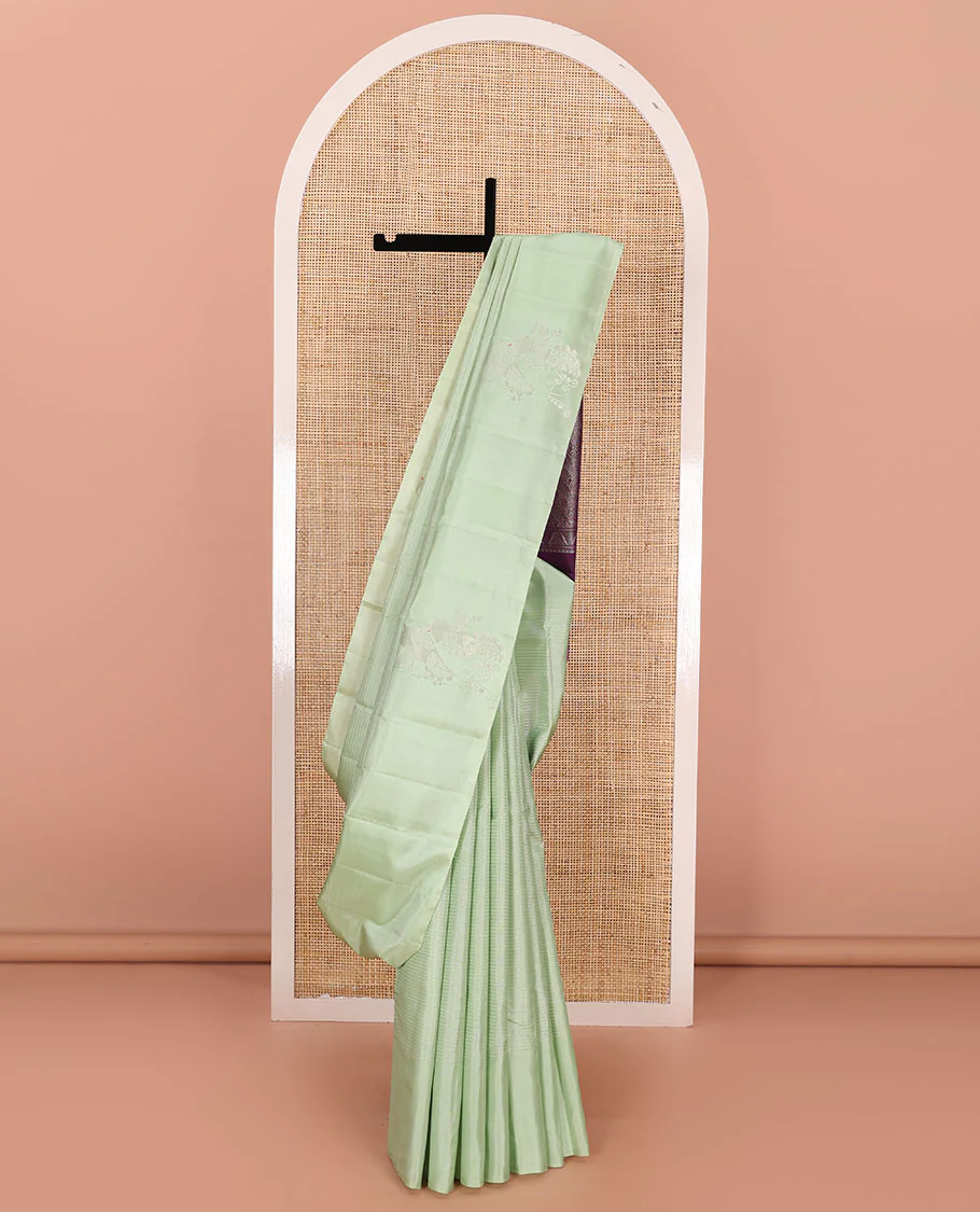 Borderless green striped Kanchipuram silk saree, contrast pallu of manga and rudraksham and kathir designs