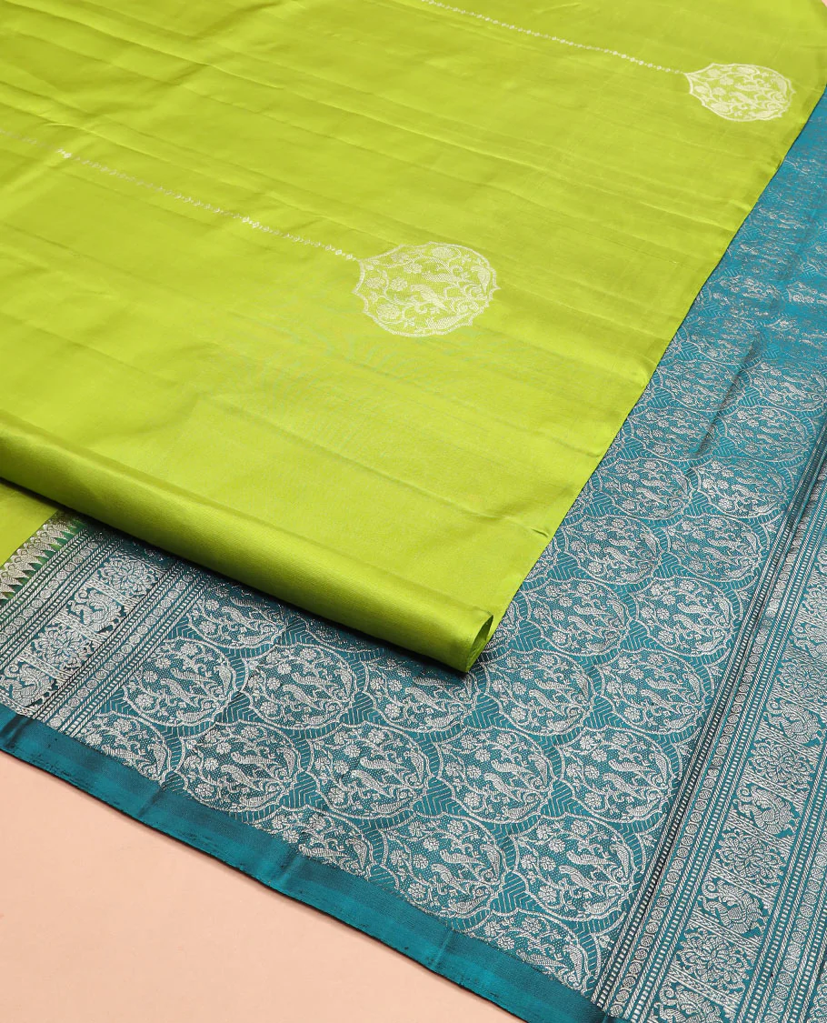 Borderless green zari buttas Kanchipuram silk saree, contrast pallu of thilakam mokku, banaras, muthu, rudraksham, annam, and floral-bird motifs - Image 2