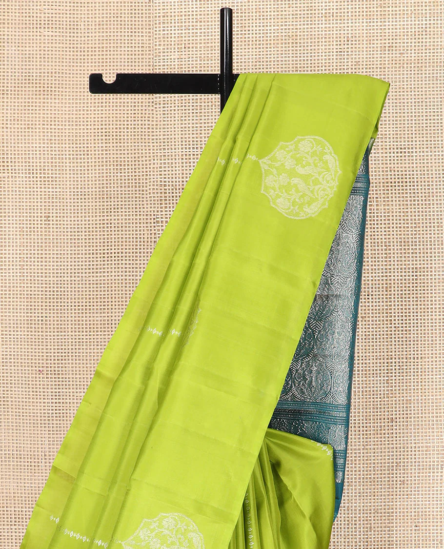 Borderless green zari buttas Kanchipuram silk saree, contrast pallu of thilakam mokku, banaras, muthu, rudraksham, annam, and floral-bird motifs - Image 3