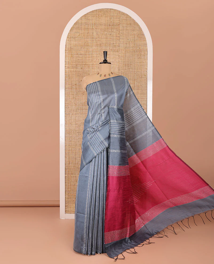 Borderless grey vertical thread sequins striped semi-raw silk saree, contrast sequin thread embroidered pallu, and a contrast plain blouse