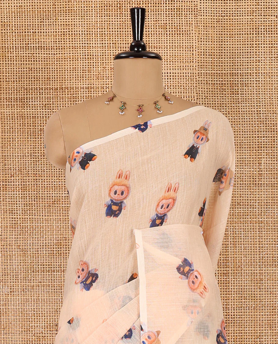 Borderless light orange labubu toy motifs printed linen cotton saree with a matching labubu toy s printed blouse - Image 3