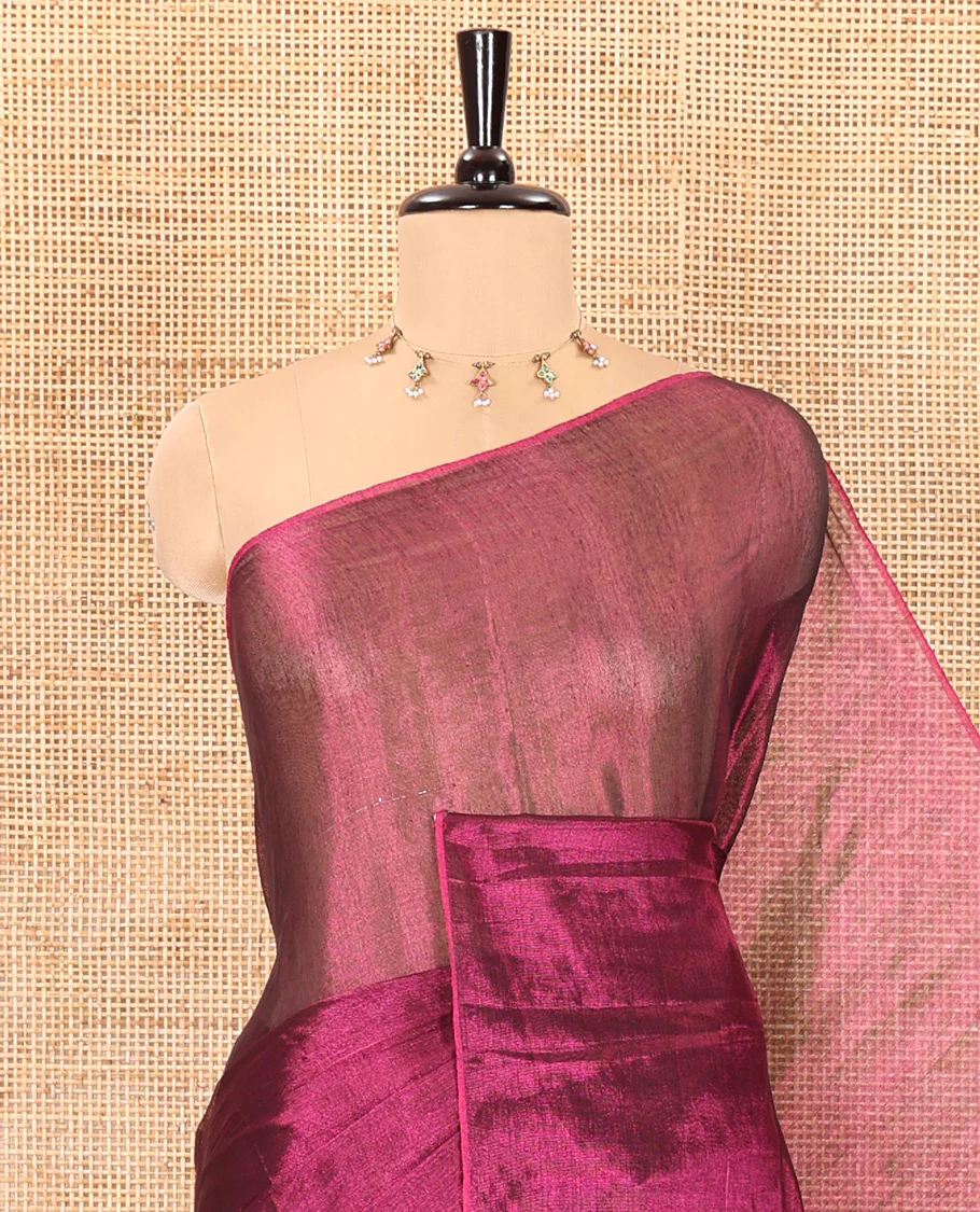Borderless magenta plain khadi tissue saree self pallu with tassels and a matching blouse - Image 2