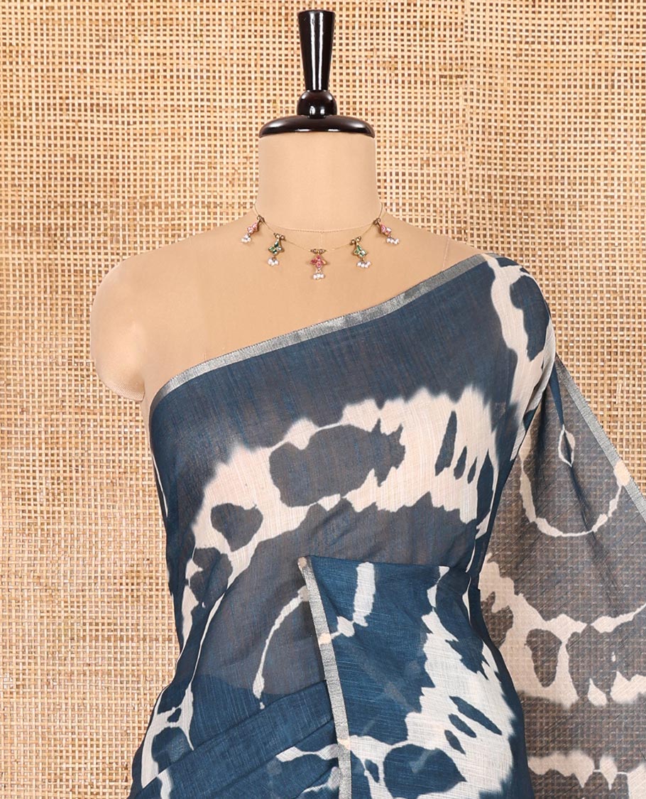 Borderless Petrol Blue Linen Cotton Saree Elevated with Shibori Prints, Complemented by Contrast Pallu Steeped with Floral Vine Print, and Paired with a Contrast Floral Printed Blouse - Image 2