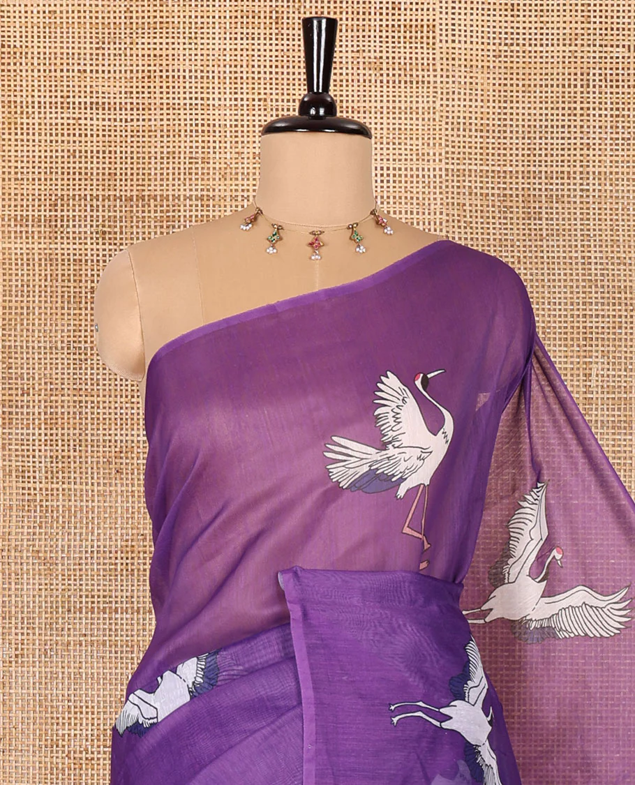 Borderless purple crane motifs printed linen cotton saree, crane motifs printed pallu, and a contrast crane printed blouse - Image 2