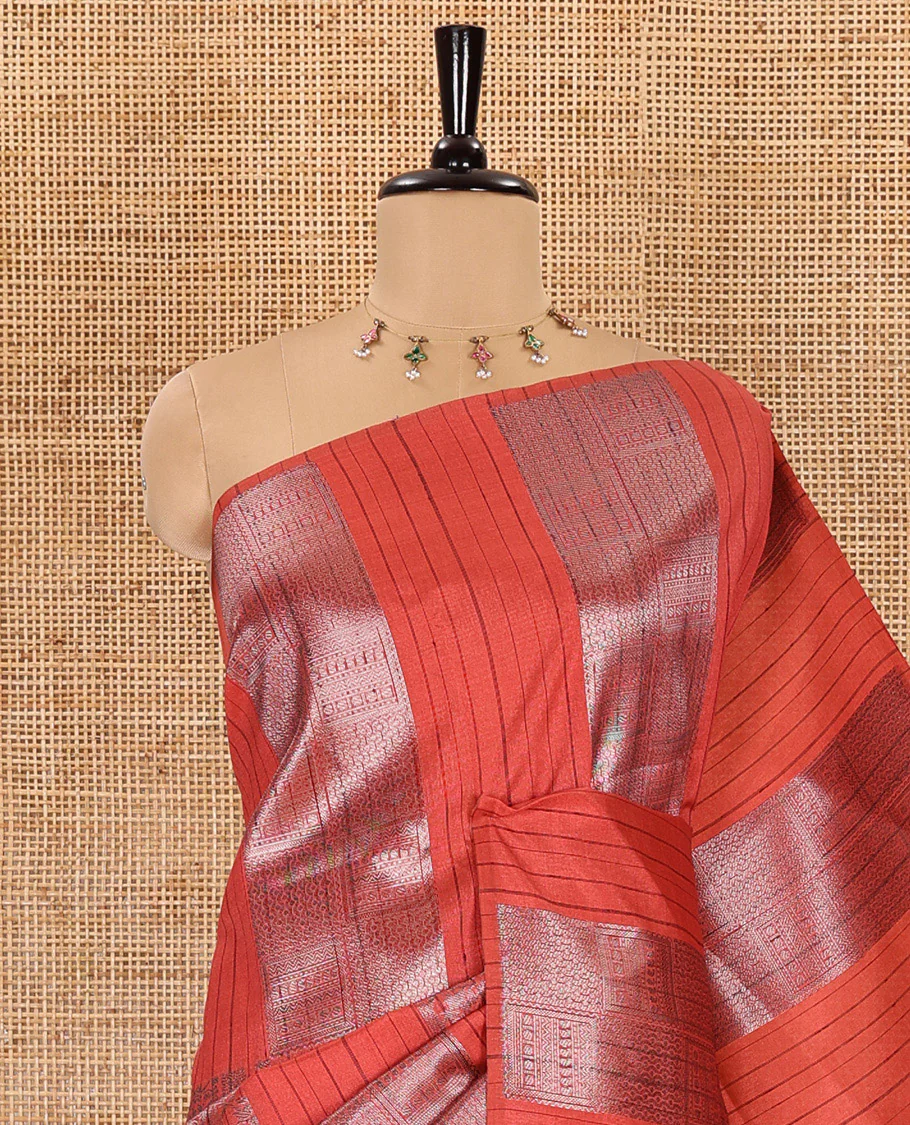 Borderless, rust orange striped, and zari traditional kanchi motifs fancy tussar saree, intricately zari-woven pallu, and a matching zari buttas woven blouse - Image 2
