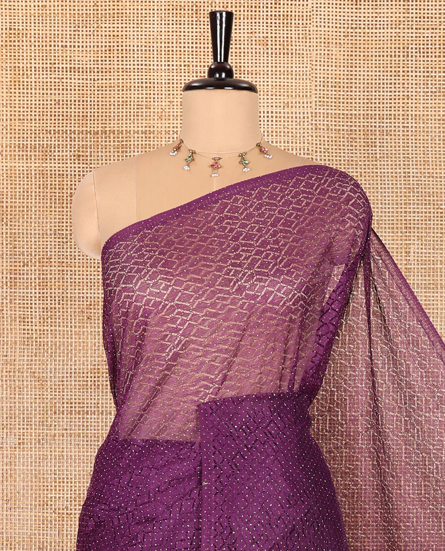Borderless violet sparkling glitter russel net saree with self-pallu, and a contrast floral printed and zig-zag patterned blouse - Image 2